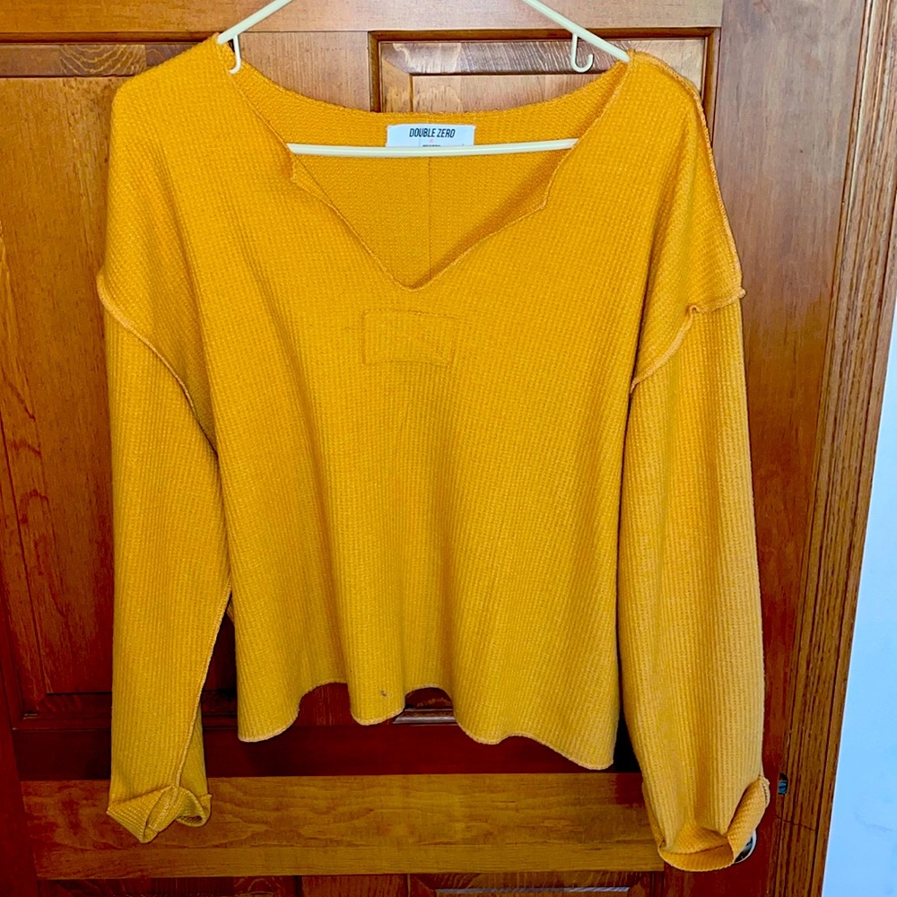 Mustard yellow long sleeve top by double zero in a waffle type print